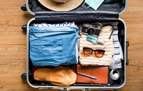 Unsere praktische Packliste für Ihr Gepäck gepackter Koffer